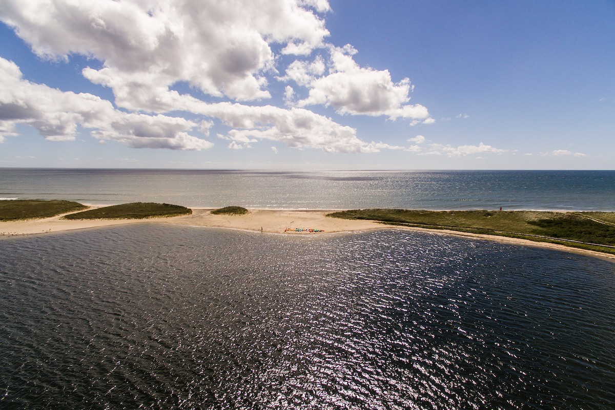 A narrow strip of sand separates Katama Bay from the Ocean, on Norton Point Beach, as seen here from the air