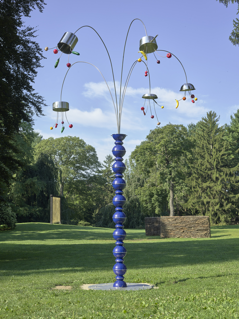 a tall colorful sculpture