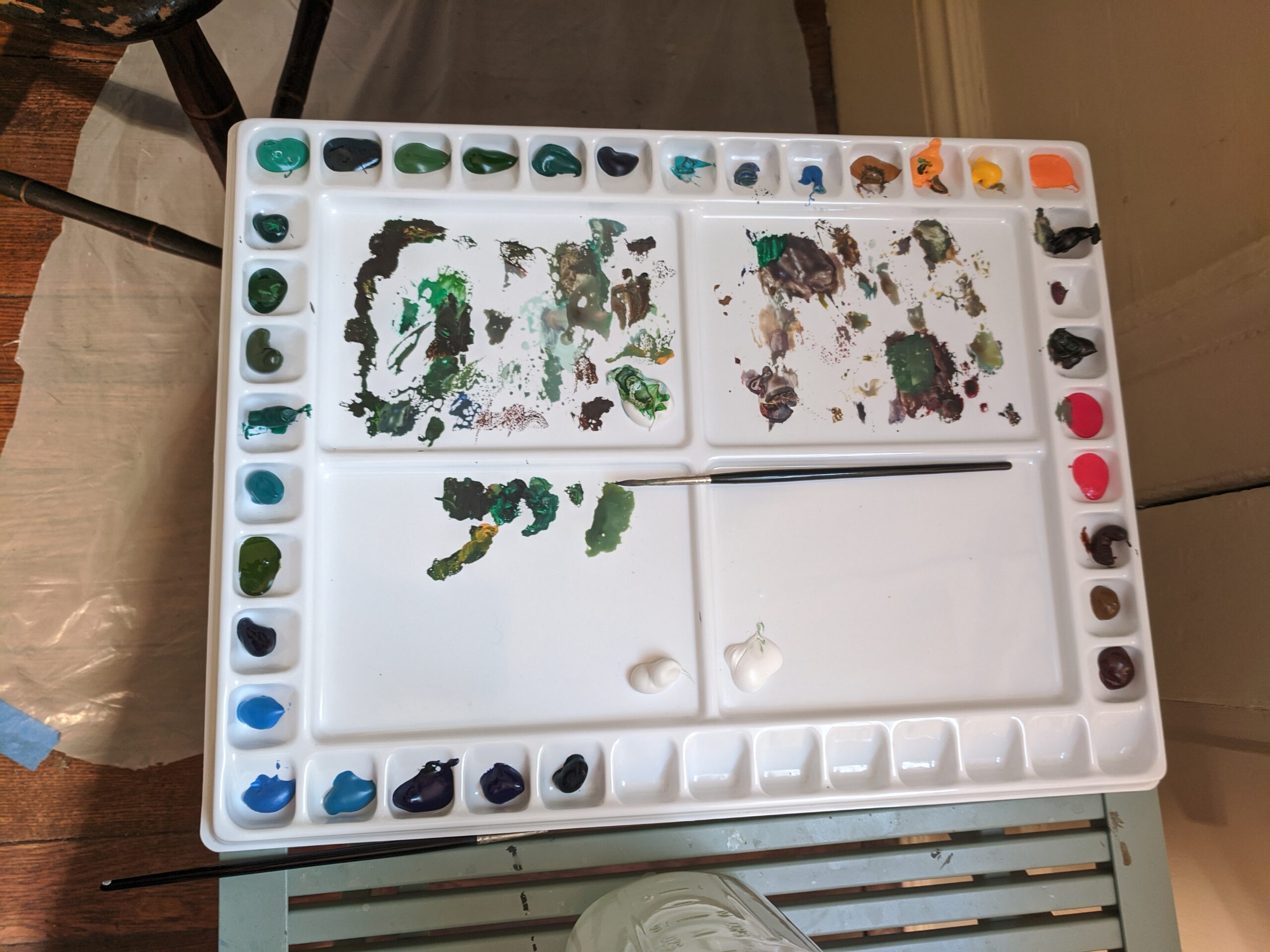 a multi colored paint palette for mural restoration work
