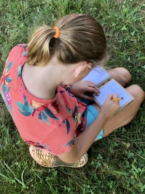 girl nature journaling