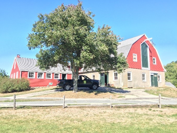This is the Red Barn. Inside are two classrooms and a workshop where we fix broken machines. We store hay for the animals in the big loft on the second floor.