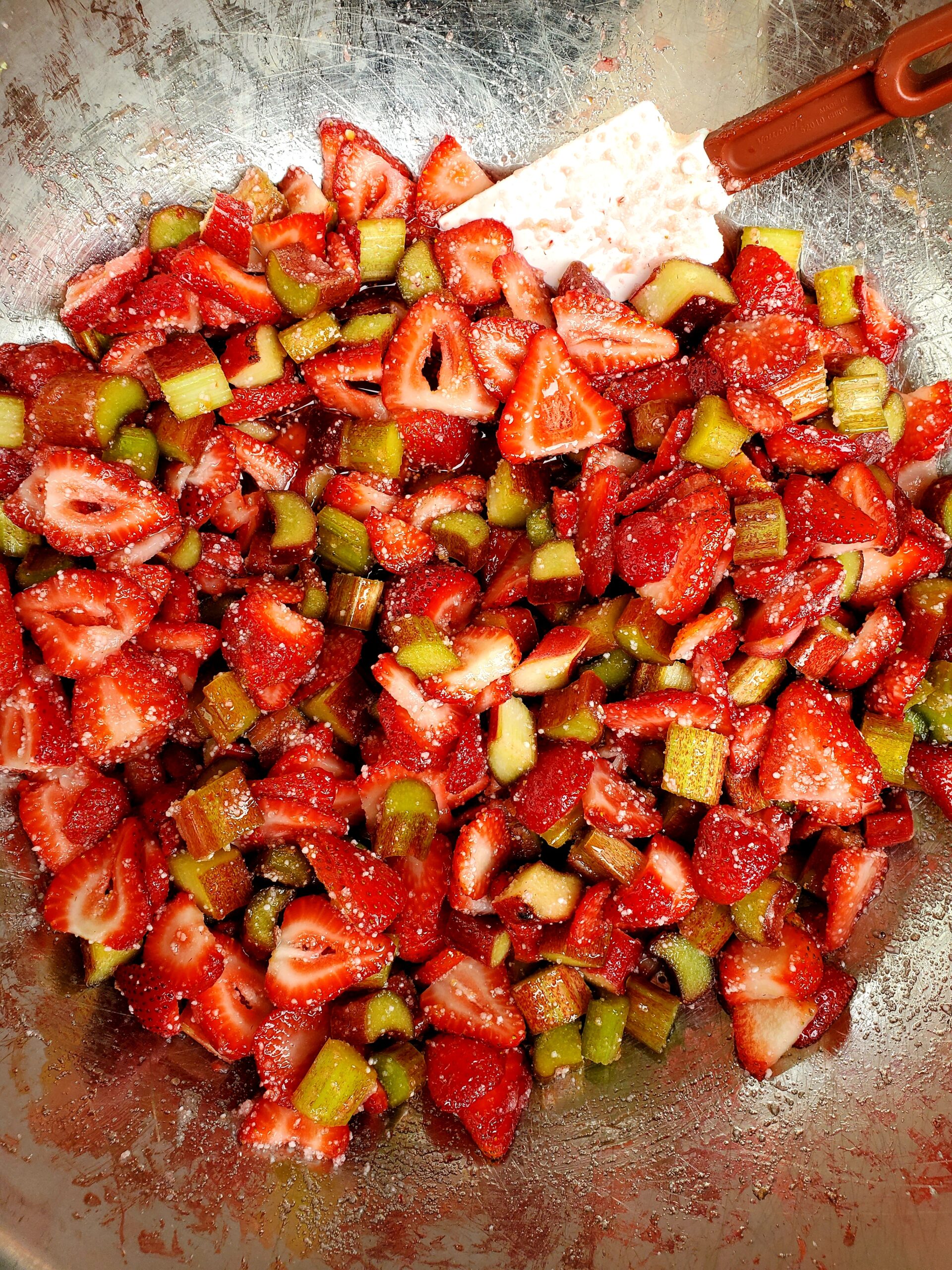strawberry rhubarb pie being made
