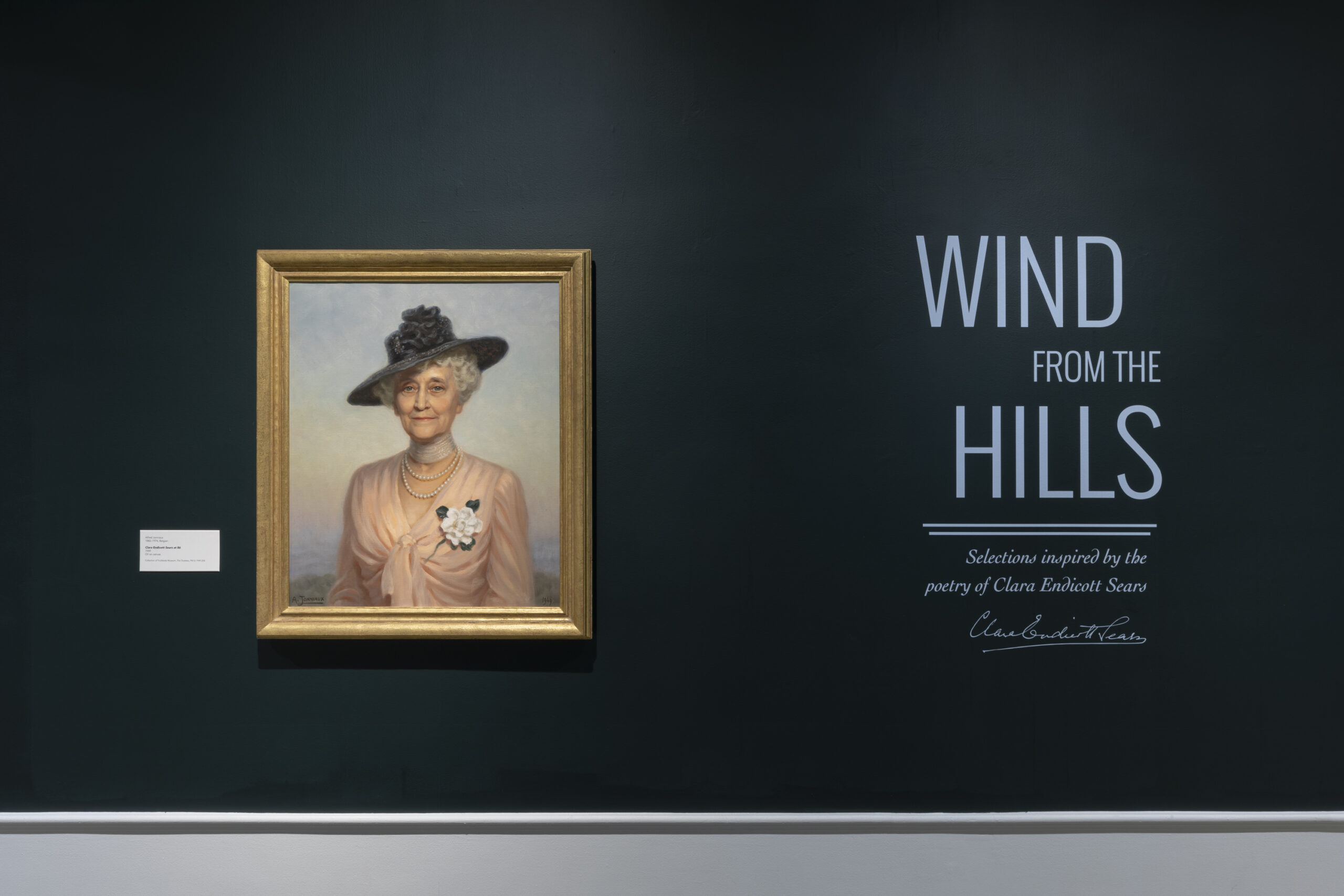 a painting of Clara Sears on a dark blue background, with the text Wind from the Hills in lighter blue