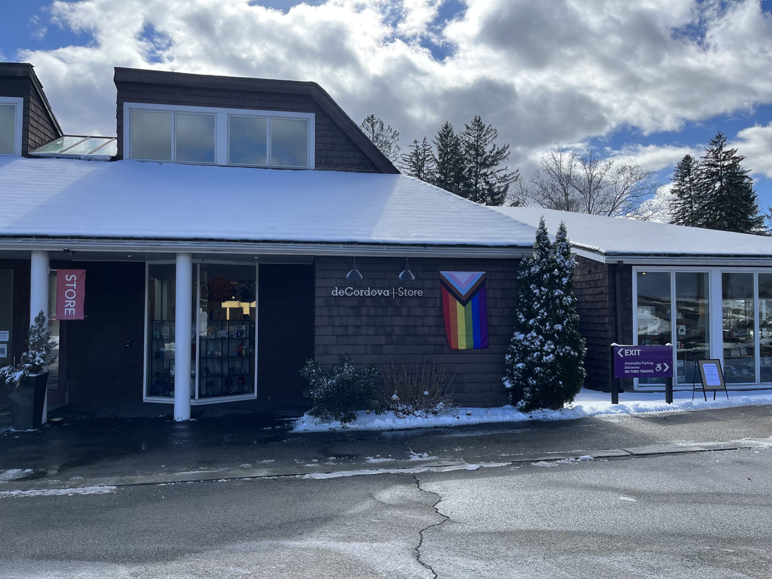 the exterior of the deCordova store, covered in snow