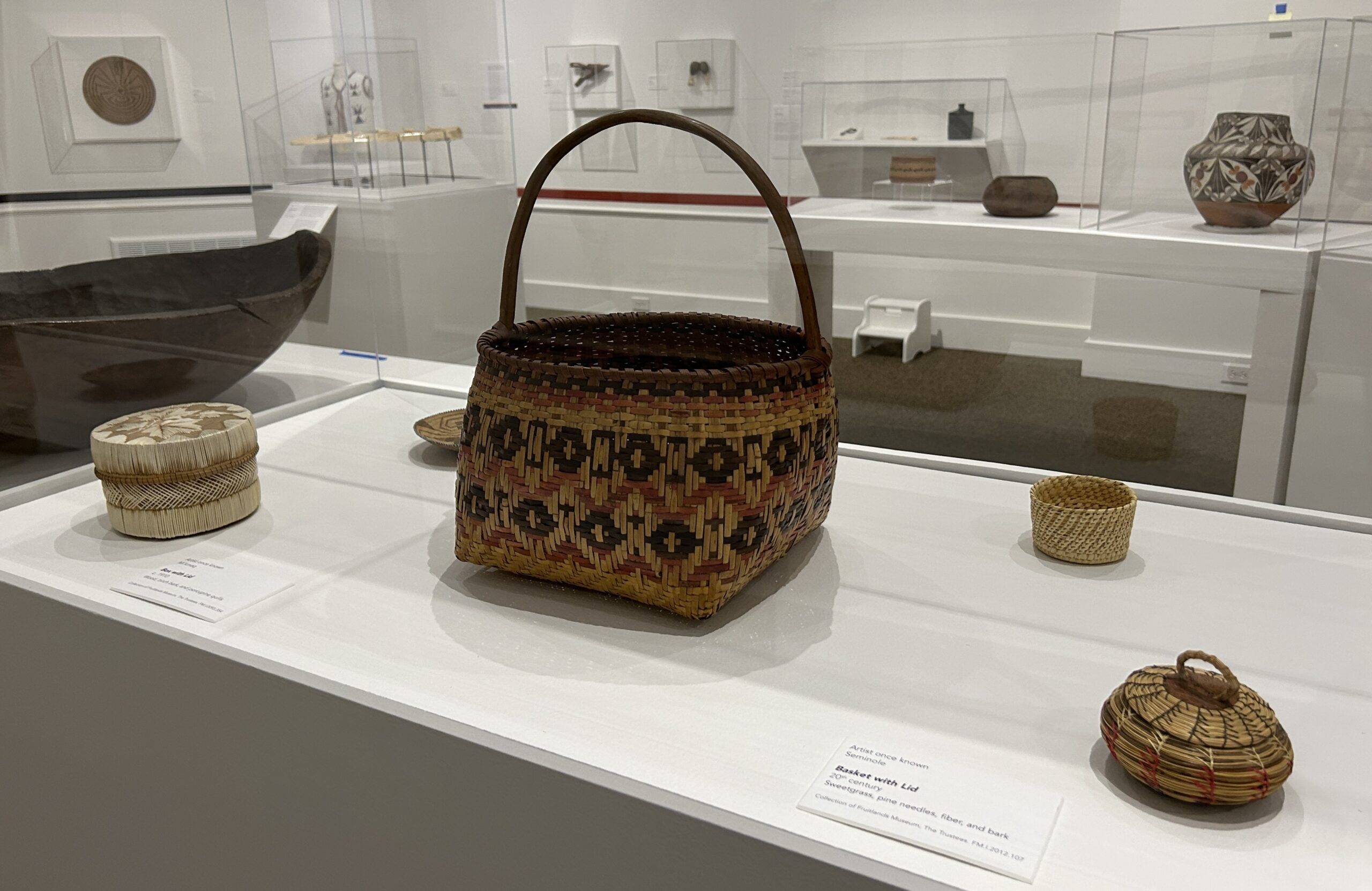 Basketry items are displayed in the 