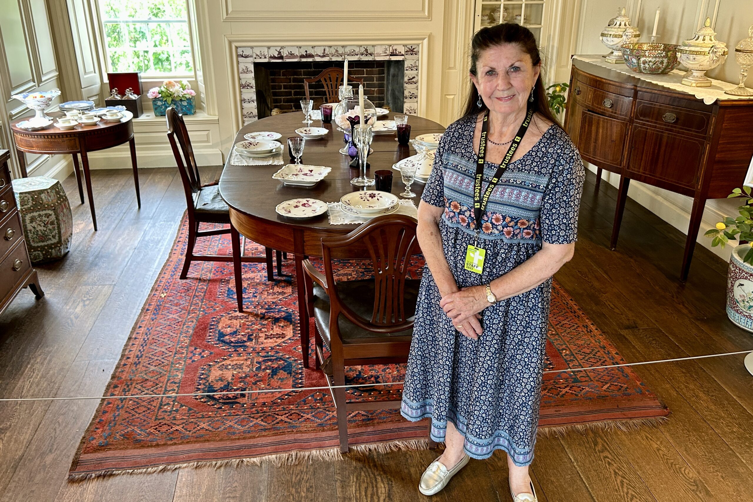 Vanessa Parminger, Trustees House Interpreter, stands in the dining room while giving a House Tour at Stevens-Coolidge House & Gardens.