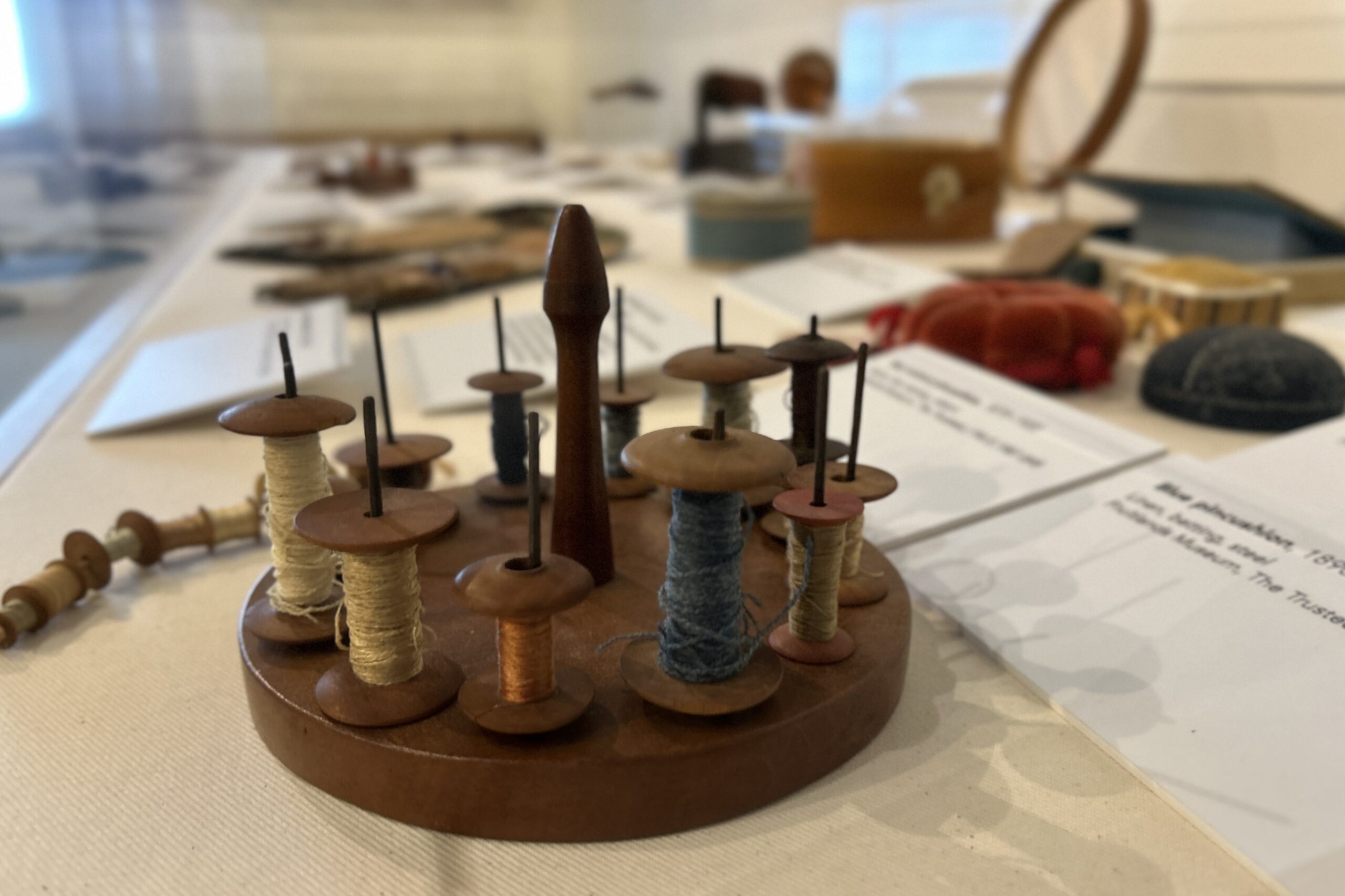 A historic Shaker Spool Stand object on display as part of