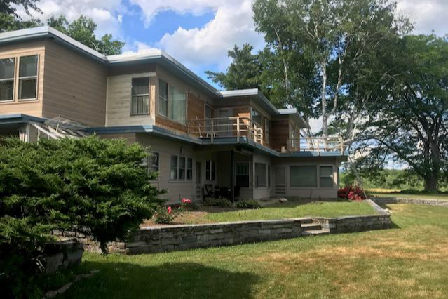 The Guest House at Field Farm gets its siding redone