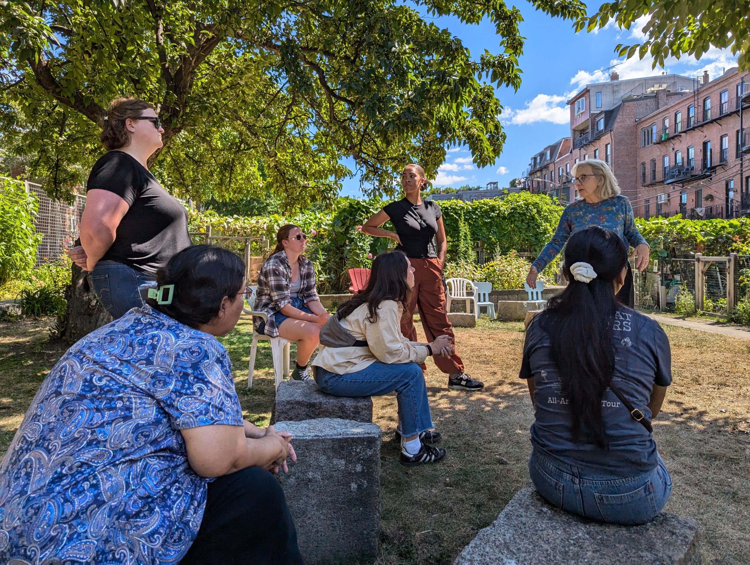 A group of people gathered in a garden