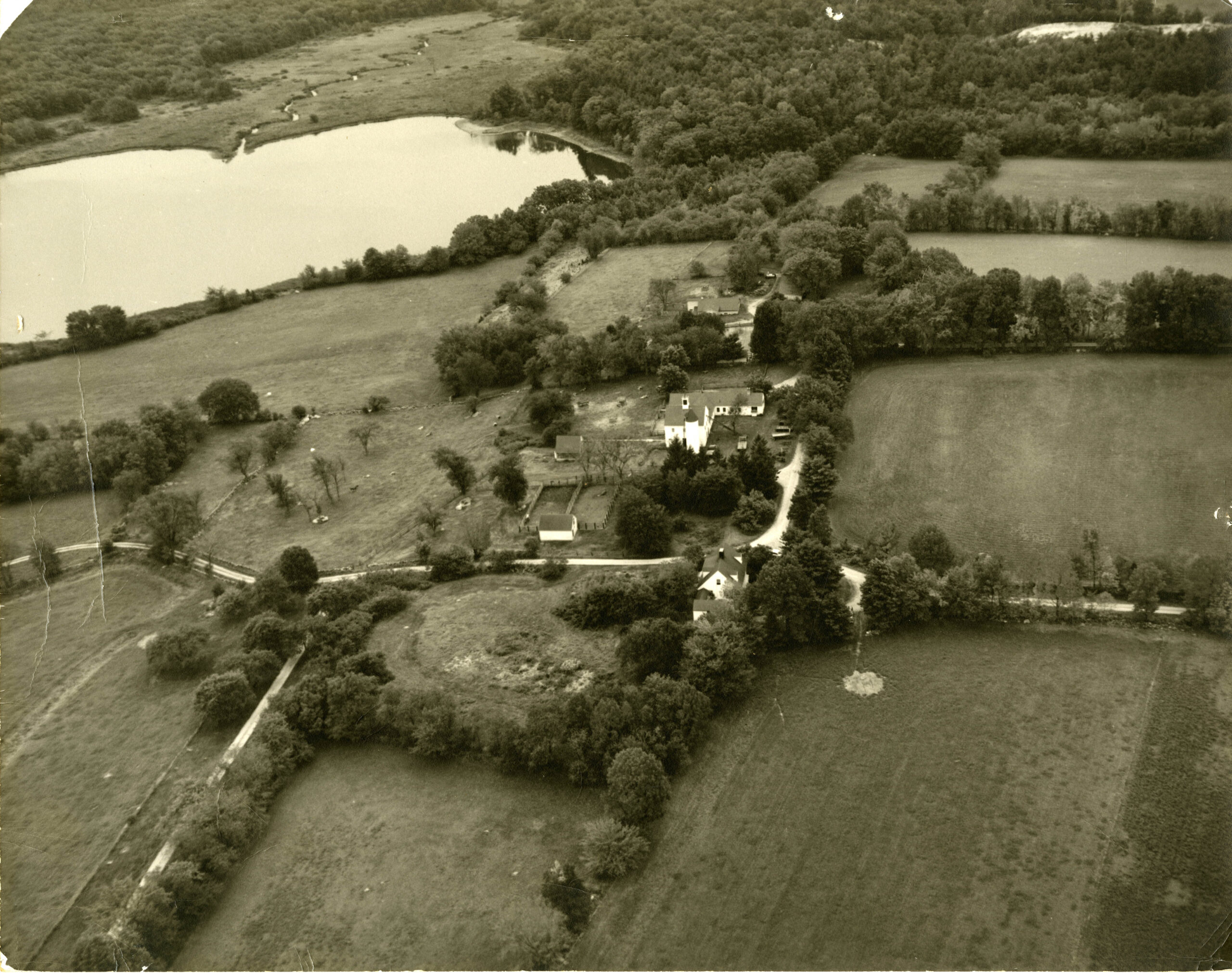 An aerial view of Millborn Farm from the 1950s (black and white)