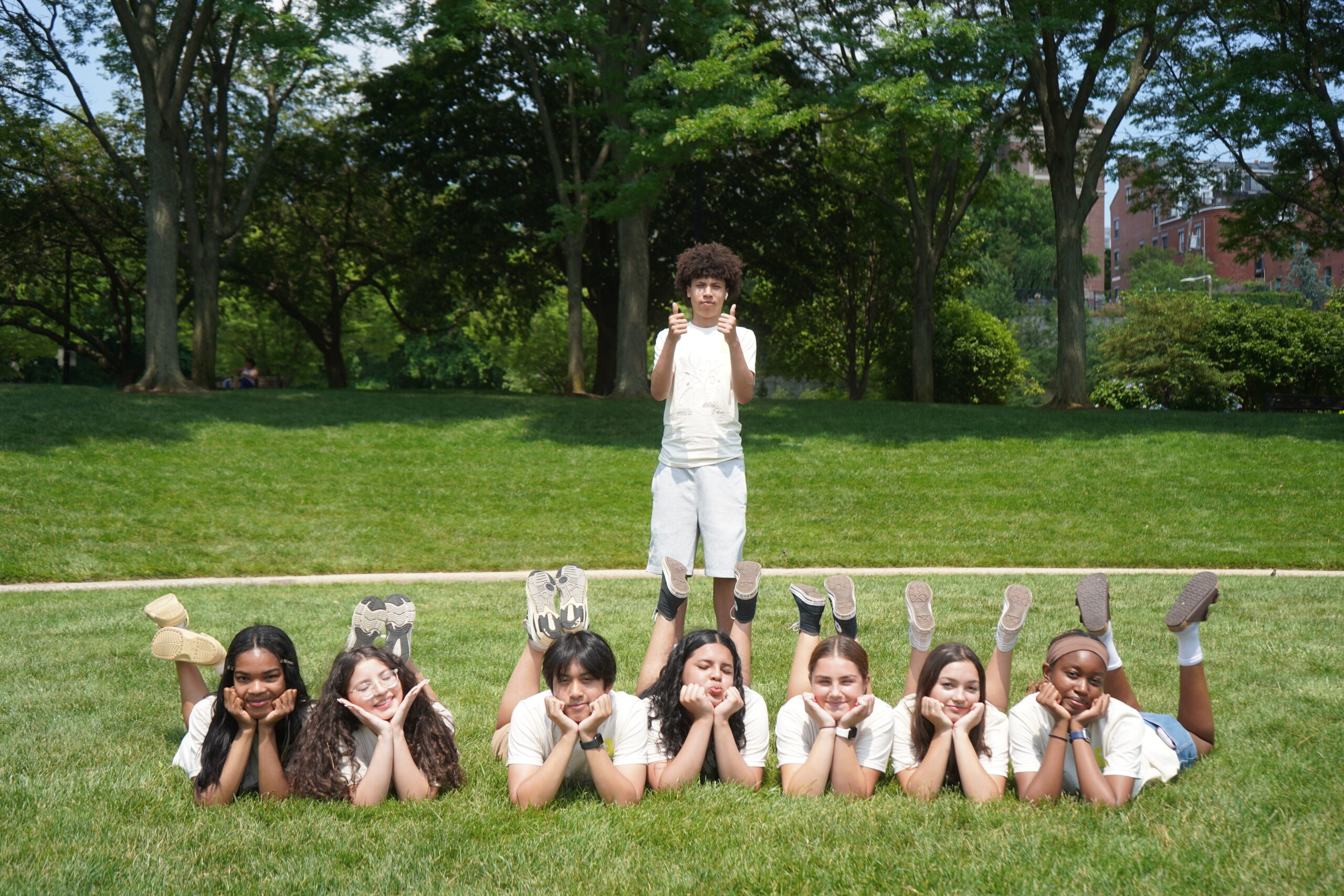 A group of teens make silly faces at the camera